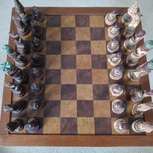 Large wood and leather vintage chess board with hand made pieces